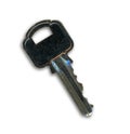 A single key cut out on a white background wit a drop shadow. Royalty Free Stock Photo