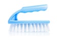 single kitchen scrubbrush with blue handle isolated on white background Royalty Free Stock Photo