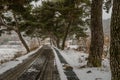 Single lane paved road during snow storm