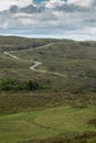 Single lane road B869 meanders through Assynt Peninsula, Scotland.