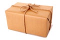Single large brown paper parcel or package tied with thick rope isolated