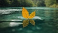 A single leaf floating in crystal-clear water against a serene nature background. Royalty Free Stock Photo