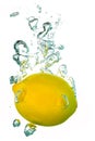 Lemon water splash with air bubbles Royalty Free Stock Photo