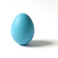 Single Light Blue Easter Egg with a Soft Shadow on a White Background isolated Royalty Free Stock Photo