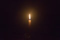 Single light candle night in the dark background Royalty Free Stock Photo