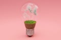 single lightbulb with green soil and clouds renewable clean energy concept 3D Illustration