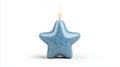 Single Lit Blue Star Candle on White Background Royalty Free Stock Photo