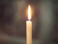 Single lit Candle light Royalty Free Stock Photo