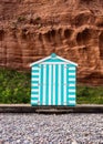 A single lone beach hut on the single of a Devon Beach