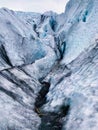 Blue Ice with Ice Pick at the VatnajÃ¶kull Glacier in Iceland