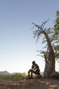 A single Lone Stone man of the Kaokoland. Contemplating existence. Marble. Kaokoland. Kunene Region, Namibia.