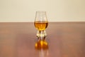 Single malt Scotch whisky with sevada malted and turfed in glencairn glass Royalty Free Stock Photo