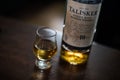 Single malt Talisker scotch whisky bottle next to a glass