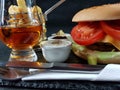 Single malt whisky glass sauces cutlery burger