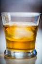 Single Malt Whisky Shot With Ice Cube Royalty Free Stock Photo