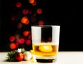 Single malt whisky in tasting glass on christmas background, co Royalty Free Stock Photo