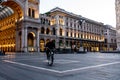 Single man on bicycle standing in front of Milan`s Cathedral, Du Royalty Free Stock Photo