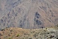 Single man hiking in the High Atlas mountain in barren area. Morocco, Africa