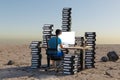 single man sitting at pc office workplace in desert environment with huge stacks of document binders workload stress burnout Royalty Free Stock Photo