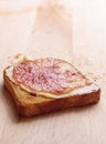 Single melba toast and jam Royalty Free Stock Photo