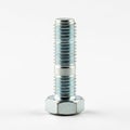 Single Metal Hex Bolt with Threaded Shaft and Hexagonal Head on a White Background screw Royalty Free Stock Photo