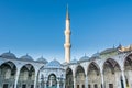 Single minaret against blue sky at the corner of  blue Mosque also called the Sultan Ahmed Mosque or Sultan Ahmet Mosque in Royalty Free Stock Photo