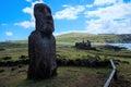 Single Moai with row of 15 Moais in Ahu Tongariki, Easter Island, Chile Royalty Free Stock Photo