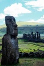 Single Moai with row of 15 Moais in Ahu Tongariki, Easter Island, Chile Royalty Free Stock Photo