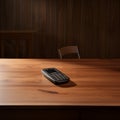 A single mobile phone on wooden table in the office