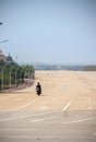 Single motorbike on empty highway Royalty Free Stock Photo