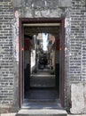 Single narrow entrance to walled city in New Territories, Hong Kong Royalty Free Stock Photo