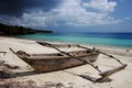 Single old wooden ship on the beach in Zanzibar