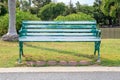 Single or alone chair in public park.