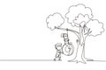 Single one line drawing happy boys and girls playing tire swing under tree. Kids swinging on tire hanging from tree. Children Royalty Free Stock Photo