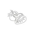 Single one line drawing sliced healthy organic strawberry for orchard logo identity. Fresh berry fruitage concept for fruit garden Royalty Free Stock Photo