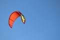 Orange kite for kitesurfung against blue sky Royalty Free Stock Photo