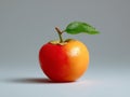 A single orange with a leaf on top of it Royalty Free Stock Photo