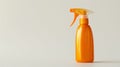 Single orange spray bottle with a trigger, isolated on a white background Royalty Free Stock Photo