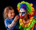 Single parent family. Mom after work birthday clown .Adult child relationship. Royalty Free Stock Photo