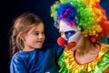 Single parent family. Mom after work birthday clown .Adult child relationship. Royalty Free Stock Photo