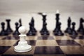 Single pawn against many enemies as a symbol of difficult unequal fight