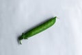 Pea pod on a white background Royalty Free Stock Photo