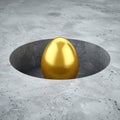 Valuable Golden Nest Egg in a Secure Hole Royalty Free Stock Photo