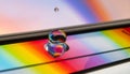 Vibrant Rainbow Reflection in a Water Droplet Royalty Free Stock Photo