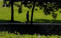 Single person silhouette walking in the `Pontido` village park, Povoa de Lanhoso.