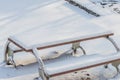 Single picnic table covered in snow Royalty Free Stock Photo