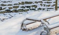 Single picnic table covered in snow Royalty Free Stock Photo