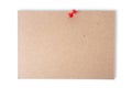 Single piece of cardboard pinned with a thumb tack with clipping path.