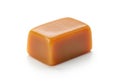 Single piece of chewy caramel candy isolated on white background Royalty Free Stock Photo