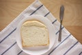 Single piece of white bread on table top